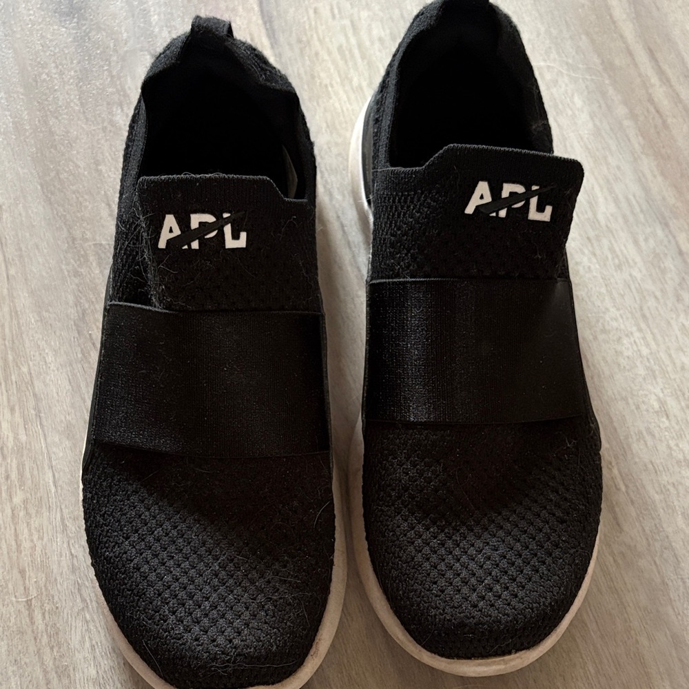 APL Size 7 Black and White Slip-On Sneakers
